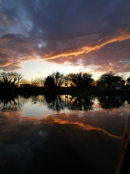 Tudor Caravan Park - Mirror Sunset by Nicky Warren